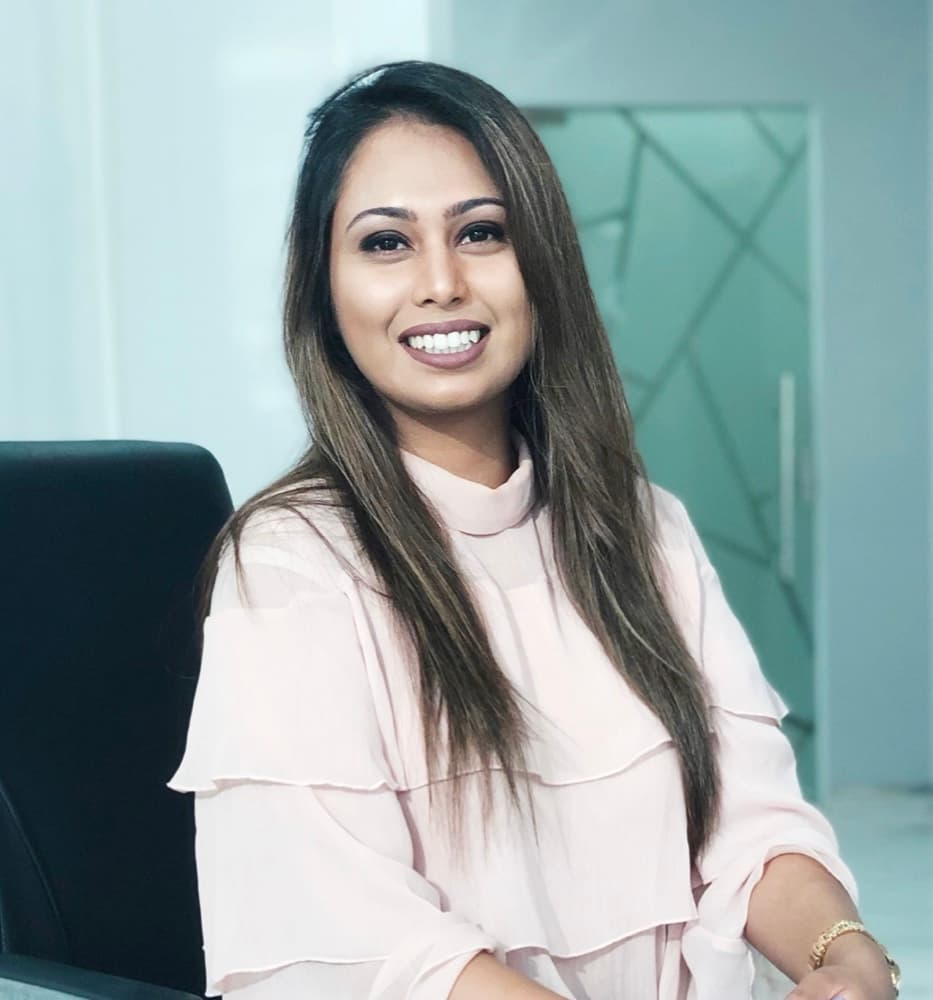 Portrait of a team member framing a camera shot